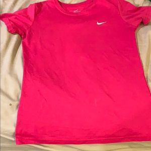 Nike DRI-FIT embroidered athletic tee.
